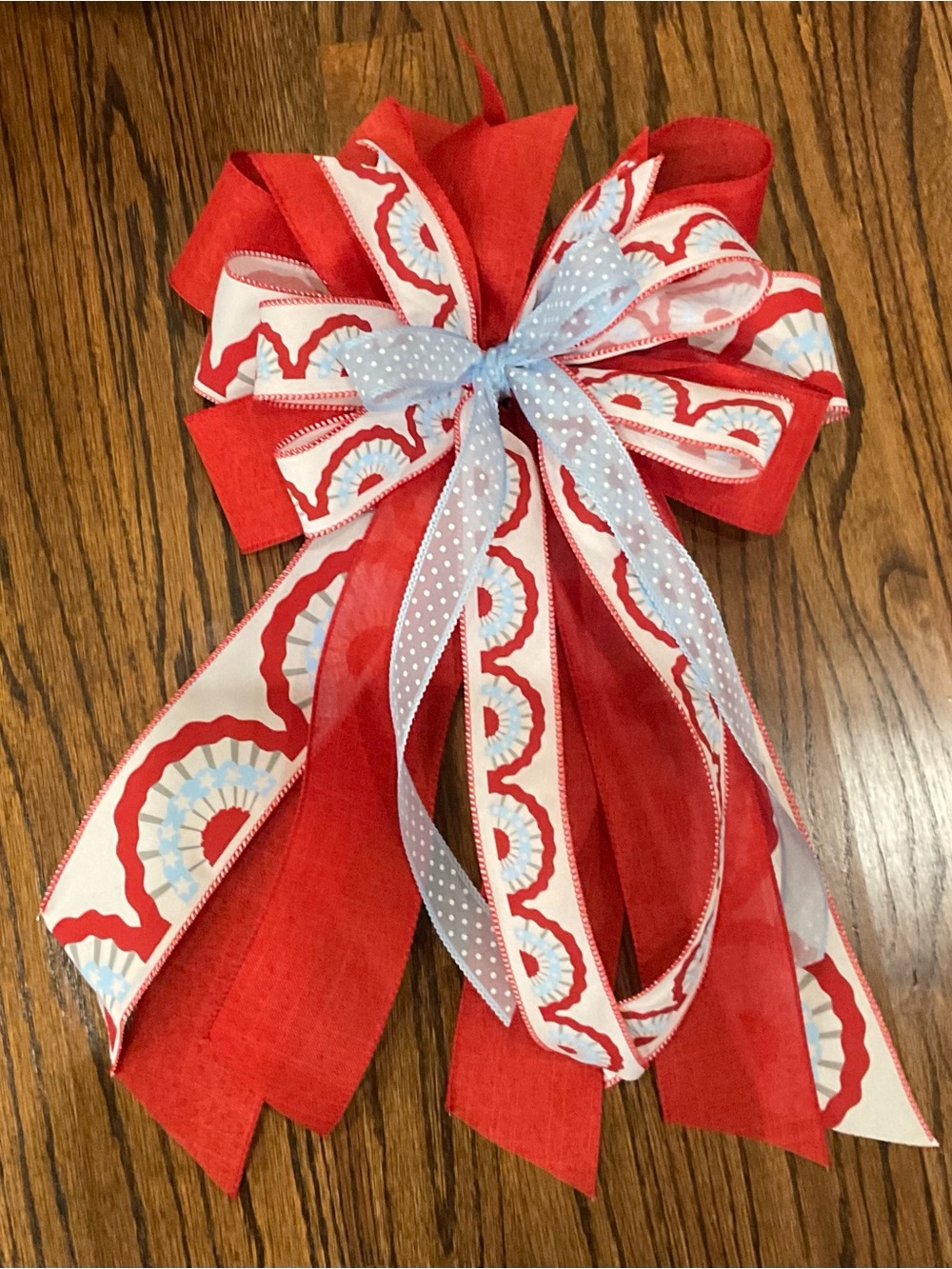 Festive Red Holiday Garland Bow with Light Blue Accent